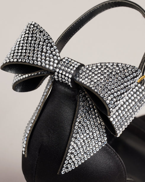 HEMARY-Sandals-We've made the perfect party shoe with HEMARY. With a stiletto heel and crystal embellished bow at the back, these satin sandals are as elegant as they are daring. Slip into the slim open toe strap and secure the buckle ankle fastening, and you're ready to dance the night away. Heeled sandals Satin finish Crystal bow embellishment Open toe Slim toe strap Stiletto heel with golden detail Buckle ankle strap- Ted Baker Romania